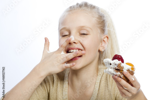 Girl eats a cake