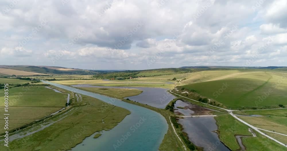 Aerial fly over view of a river in the English countryside Aerial fly over view of a river in the English countryside