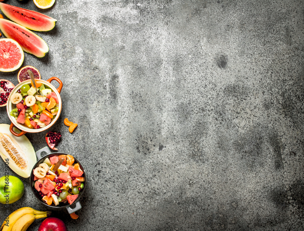 Tropical food . Fresh tropical fruit salad in bowls.