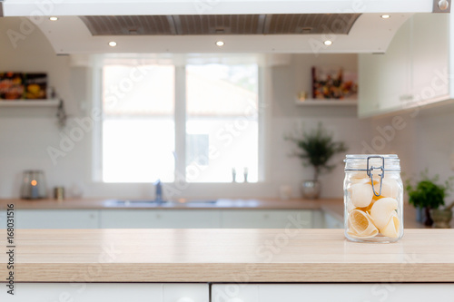 kitchen banner with countertop with a glass jar with pasta ktichen unfocuesd in the background