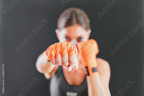 Power Female Punching With Boxing Bandage