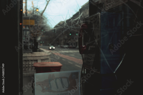 Telephone booth in city photo