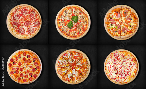 Six different pizza set for menu on a black background.Italian food traditional cuisine. Meat pizzas with salami, seafood, ham, pepperoni, barbecue and flaming pie. 