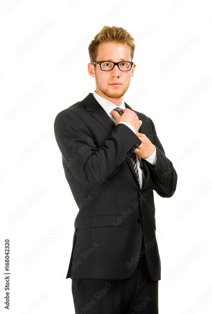 Young, handsome business man wearing black suit. Young, handsome business man wearing black suit.
