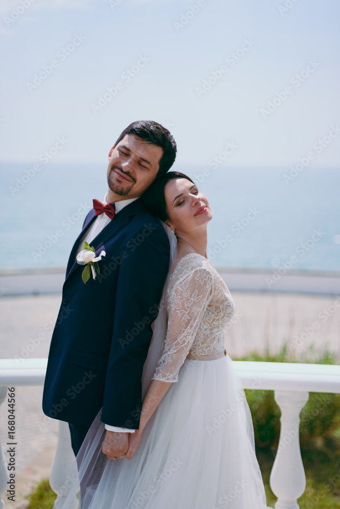 Beautiful bride and groom couple walking at the wedding