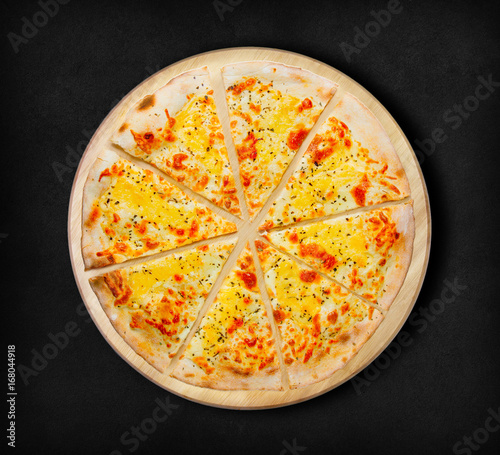 Pizza four cheese on a black background. Visit my page. You will be able to find an image for every pizza sold in your cafe or restaurant. 