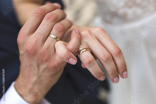 Wedding rings on the fingers