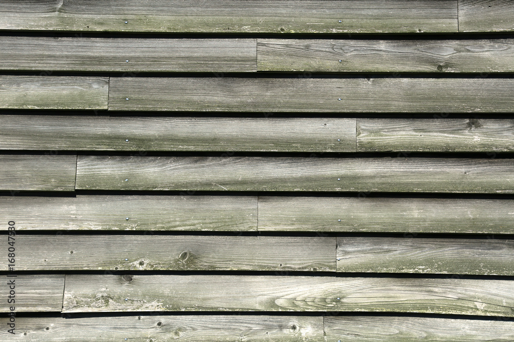 Obraz premium grau verwitterte Holzbretter