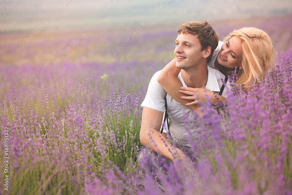 Beautiful couple on the lavender field Beautiful couple on the lavender field