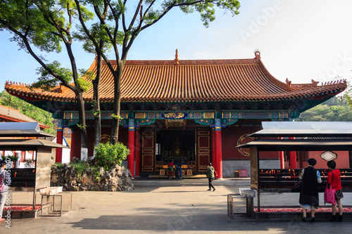 Traditional Buddhist temple in China with worshippers