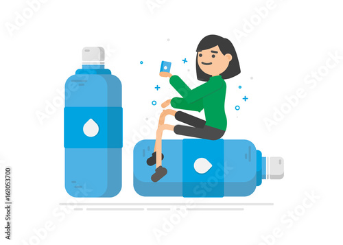 Young woman is drinking water from a plastic bottle. 