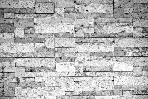 Puzzle brick grunge texture wall background. Haunt and horror. Rough and mess. Black and white colors. Close up.