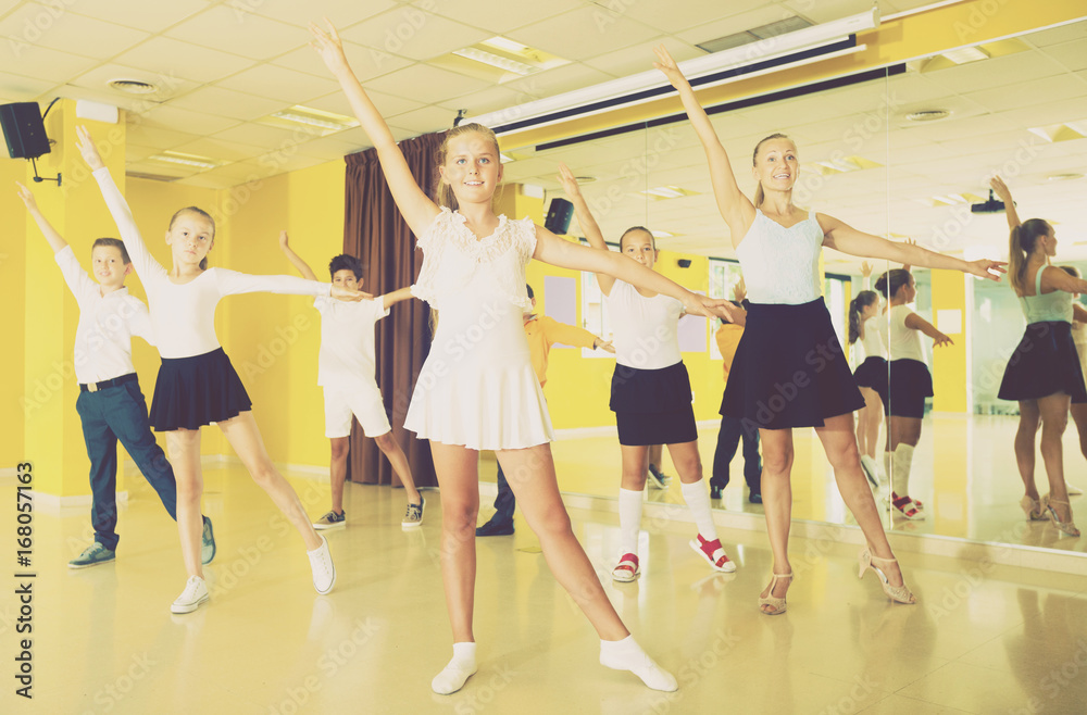 Children learn dance movements