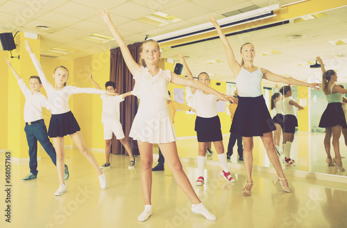 Fototapeta Naklejka Na Ścianę i Meble -  Children learn dance movements