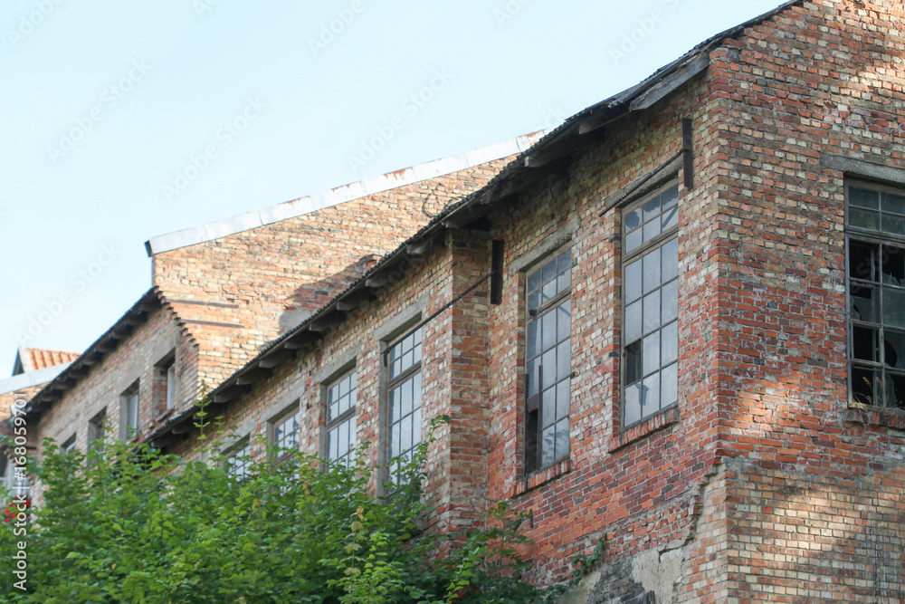 Old brick house left abandoned in countryside. Old brick house left abandoned in countryside.
