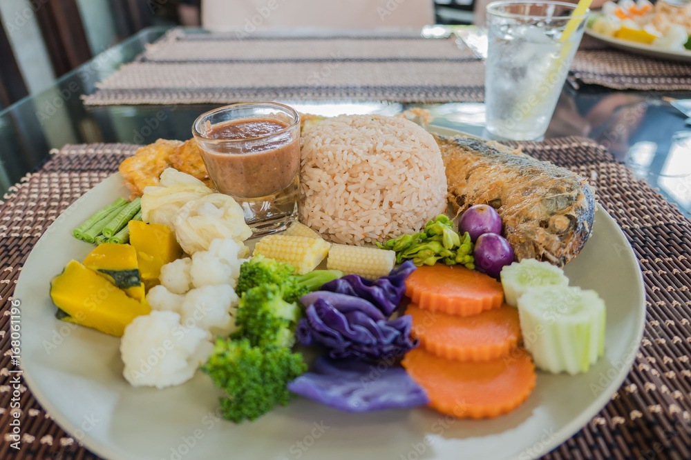 set rice Spicy Shrimp Paste and Chill Sauce Served with Mixed colorful  Vegetable in plate .(Nam Prik Ka Pi) - obrazy, fototapety, plakaty 