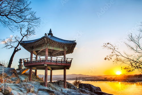 Korean traditional pavilion on the rock by the river in the sunrise