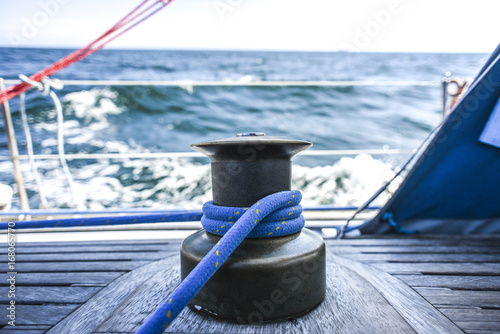 Kabestan with a rope on a yacht, during a cruise on the North Sea.