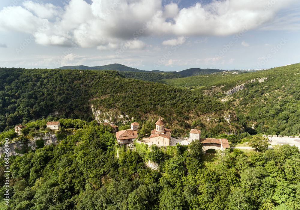 AERIAL. Old monastery hiding in the forests, also known as Motsameta, Georgia