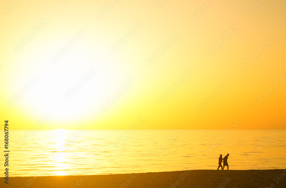 couple at sunset on the beach