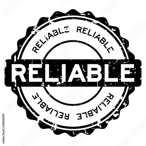 Grunge black reliable round rubber seal stamp on white background