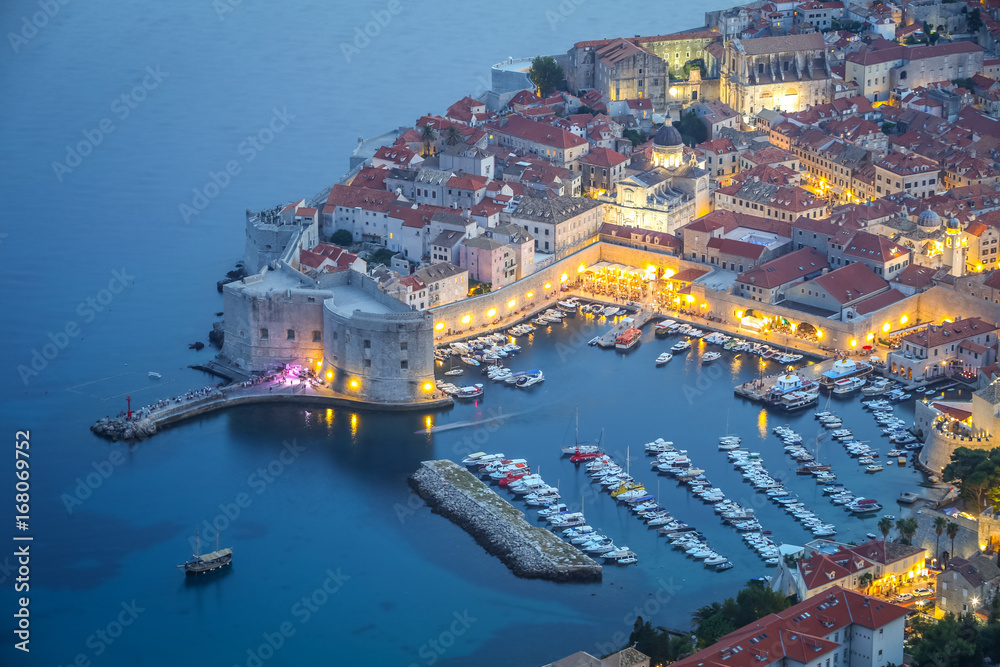 An aerial view of the ancient old town Dubrovnik at sunset in Dalmatia, Croatia.