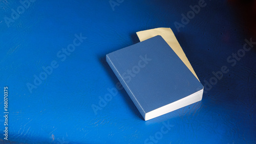 Fotografija blue notebook on blue background
