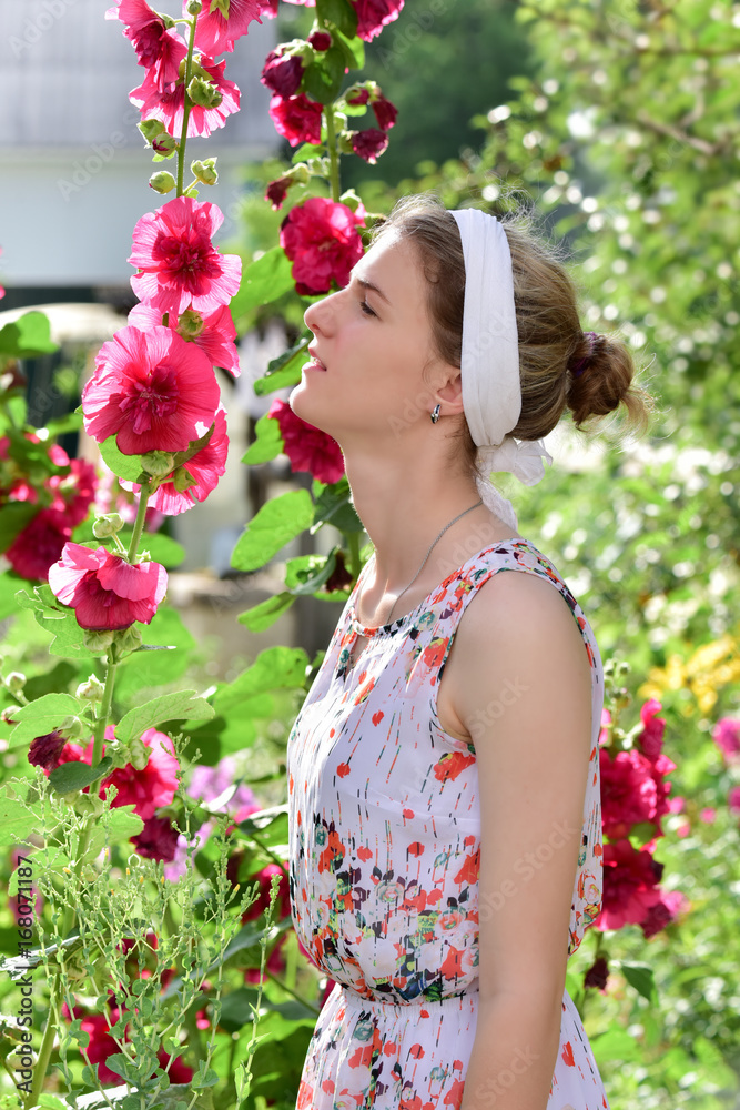 Fototapeta premium The collection of bouquet/ The girl in the garden tending the flowers