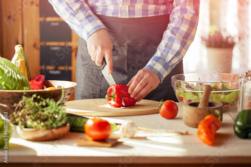 male cooking healthy salad