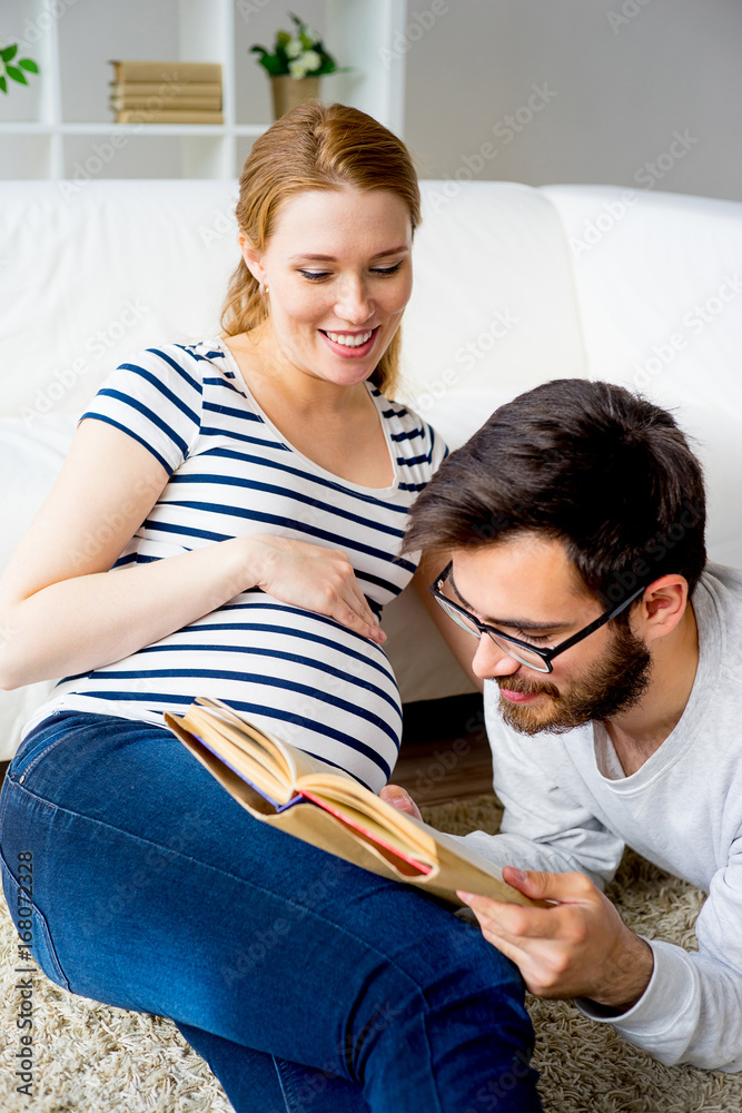 Fototapeta premium Future father reading a book