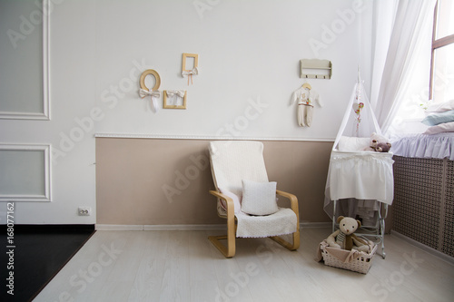 Interior of a nursery with a crib for a baby