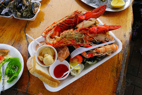 Принти на полотні Mixed seafood platter with lobster and langostinos in Scotland