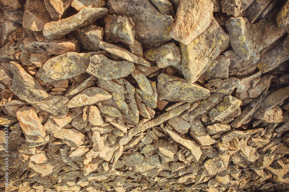 Abstract background with natural stone pieces. Texture of rocky mountains
