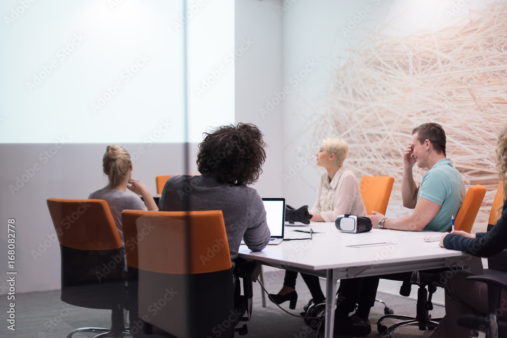 Startup Business Team At A Meeting at modern night office building