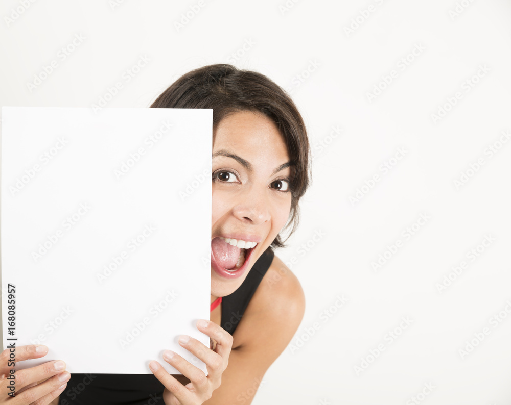 Beautiful young woman holding a blank sheet of paper Beautiful young woman holding a blank sheet of paper