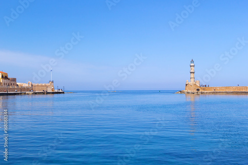 Fototapeta Naklejka Na Ścianę i Meble -  Lighthouse of the old Venetian port in Chania, Crete. Greece