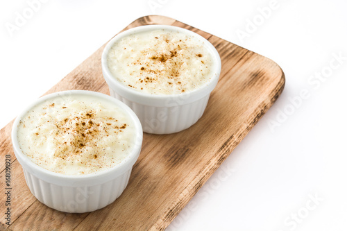 Arroz con leche. Rice pudding with cinnamon isolated on white background
