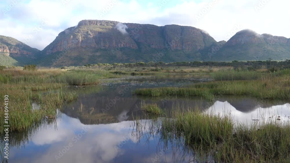 Pan from mountains with reflection in a lake at Waterberg South Africa Pan from mountains with reflection in a lake at Waterberg South Africa