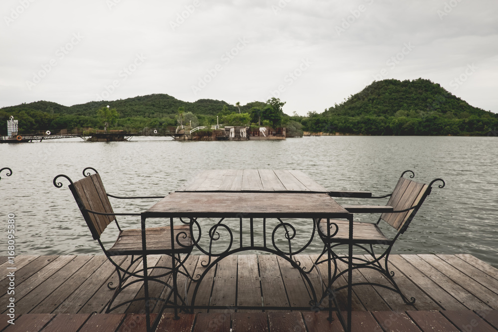 Antique wooden chairs on the river. Antique wooden chairs on the river.