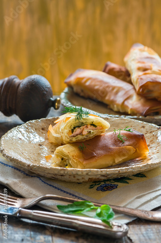 Salmon and basil butter filo parcels