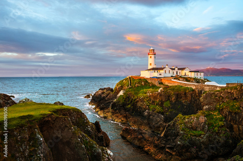 Fanad head at Donegal, Ireland with lighthouse at sunset
