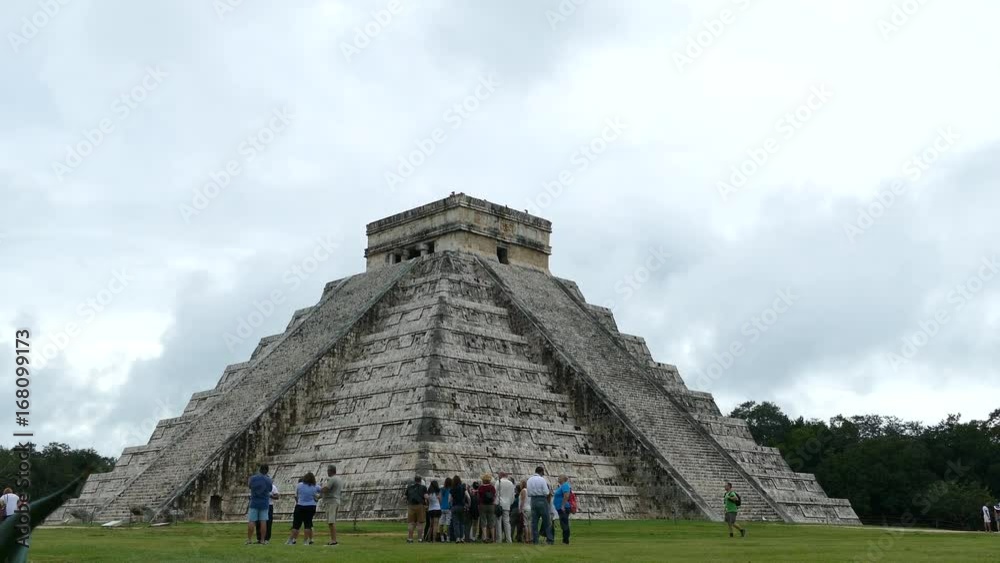 Tourists in front of Chichen Itza Mayan ruin in Yucatan Mexico Tourists in front of Chichen Itza Mayan ruin in Yucatan Mexico