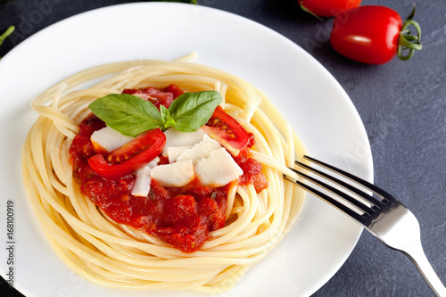 Spaghetti with tomato sauce and parmesan