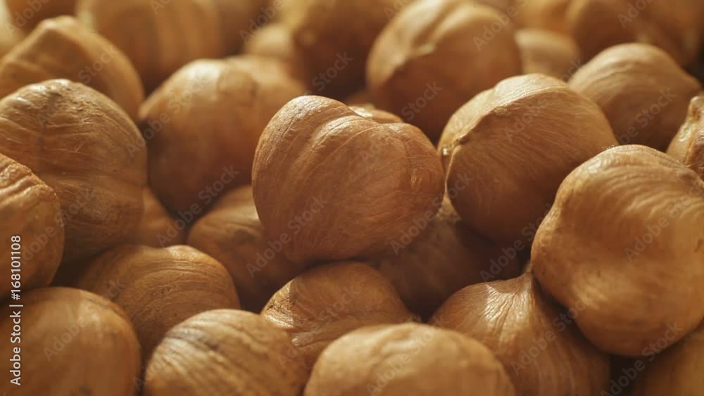 Macro shot of advancing hazelnut kernels, conquering the stand space Macro shot of advancing hazelnut kernels, conquering the stand space
