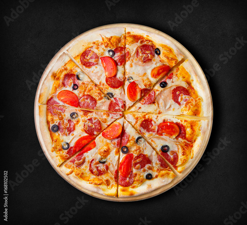 Pepperoni pizza on a black background.  Visit my page. You will be able to find an image for every pizza sold in your cafe or restaurant 