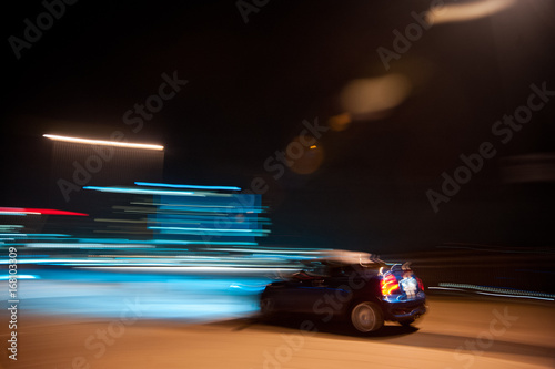 Blue Mini S Coupé Car, Speeding Through The Night