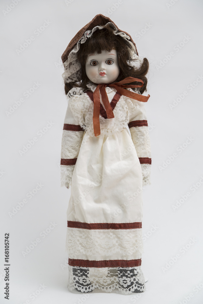 Ceramic porcelain handmade doll with brown hair and white dress Ceramic porcelain handmade doll with brown hair and white dress