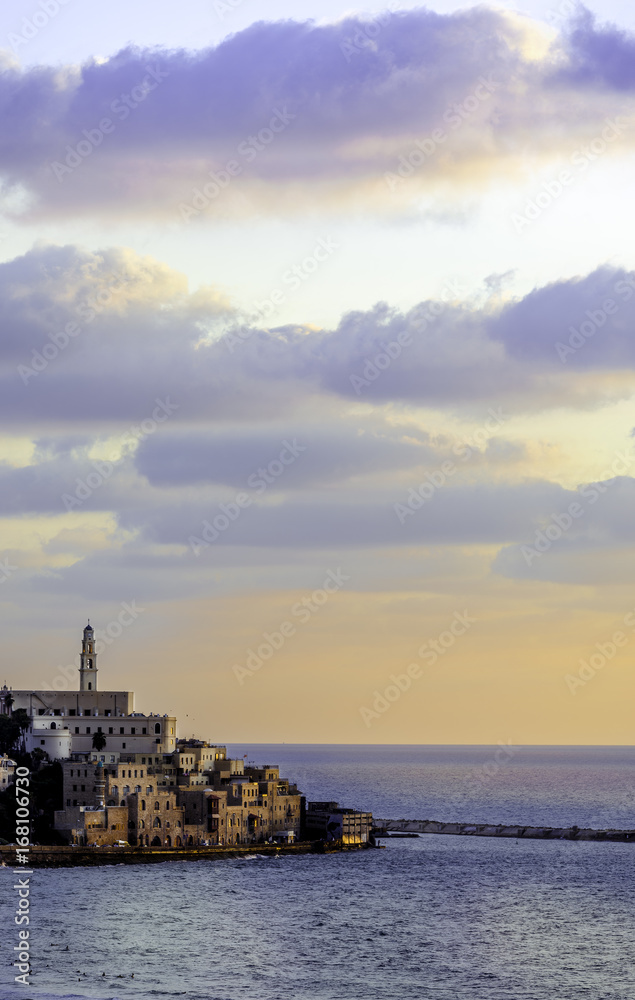 Jaffa port promenade at sunset with saint Peter church 