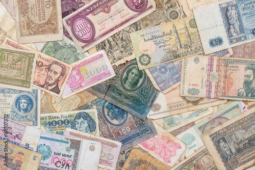 Old world paper money of different countries as background