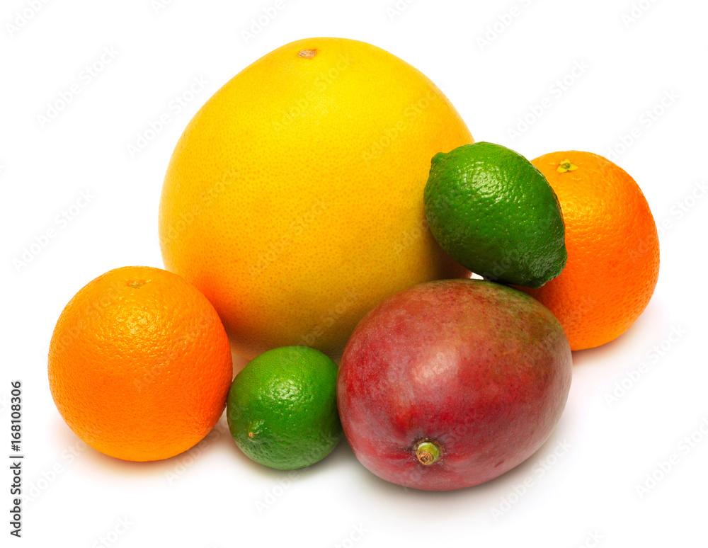 Assorted tropical fruit lime, pomelo, mango and lime isolated on white background. A healthy and nutritious food for health after training in sports for burning fat. Flat lay, top view Assorted tropical fruit lime, pomelo, mango and lime isolated on white background. A healthy and nutritious food for health after training in sports for burning fat. Flat lay, top view